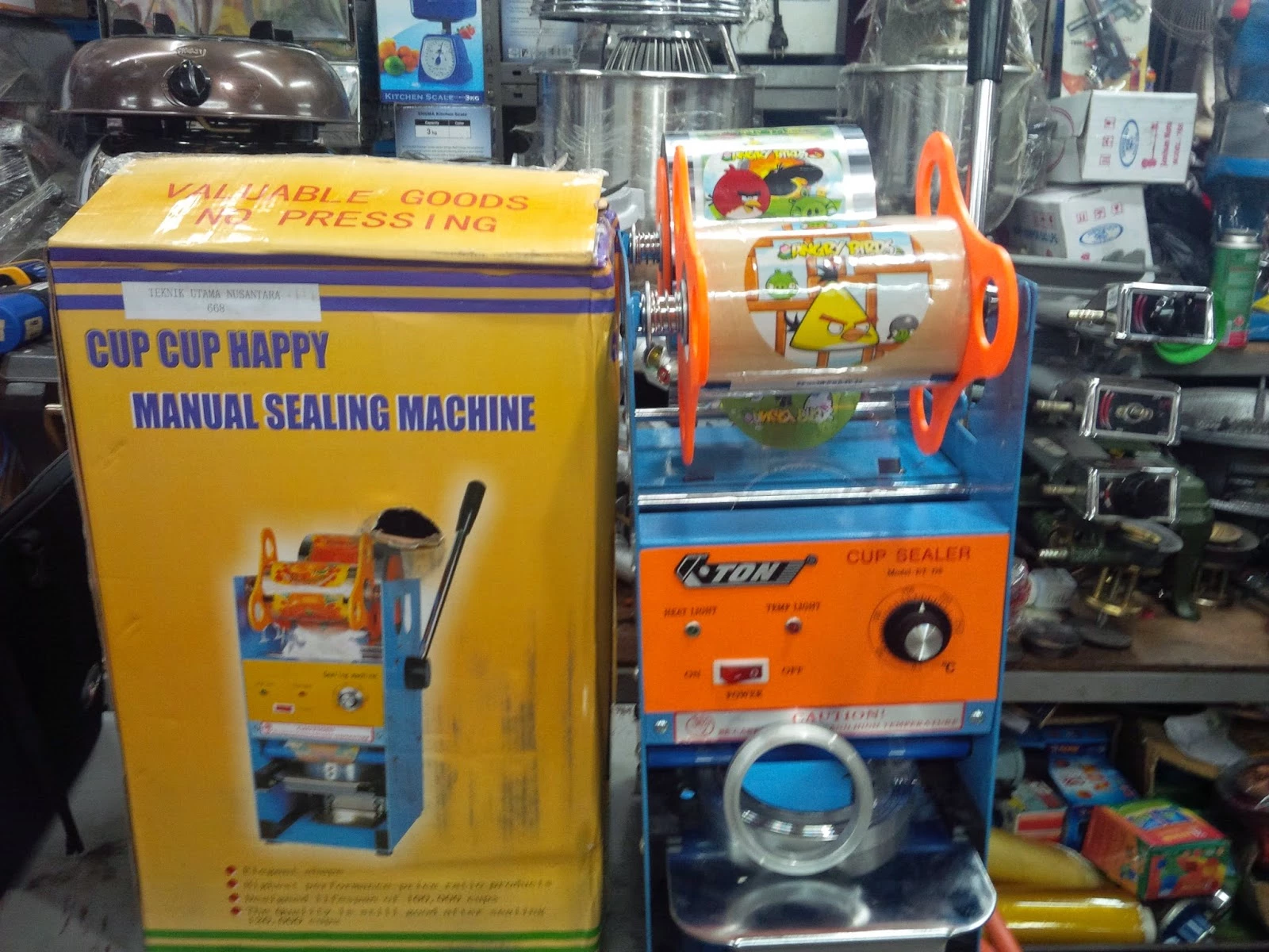 Keuntungan Investasi dalam Mesin Cup Sealer untuk Skala Industri